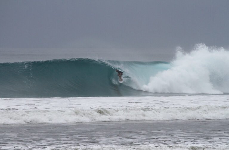 Surfer in a perfect barrel at Manabi beach break