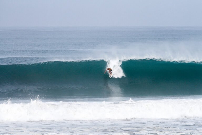 Surfer at Manta beach break