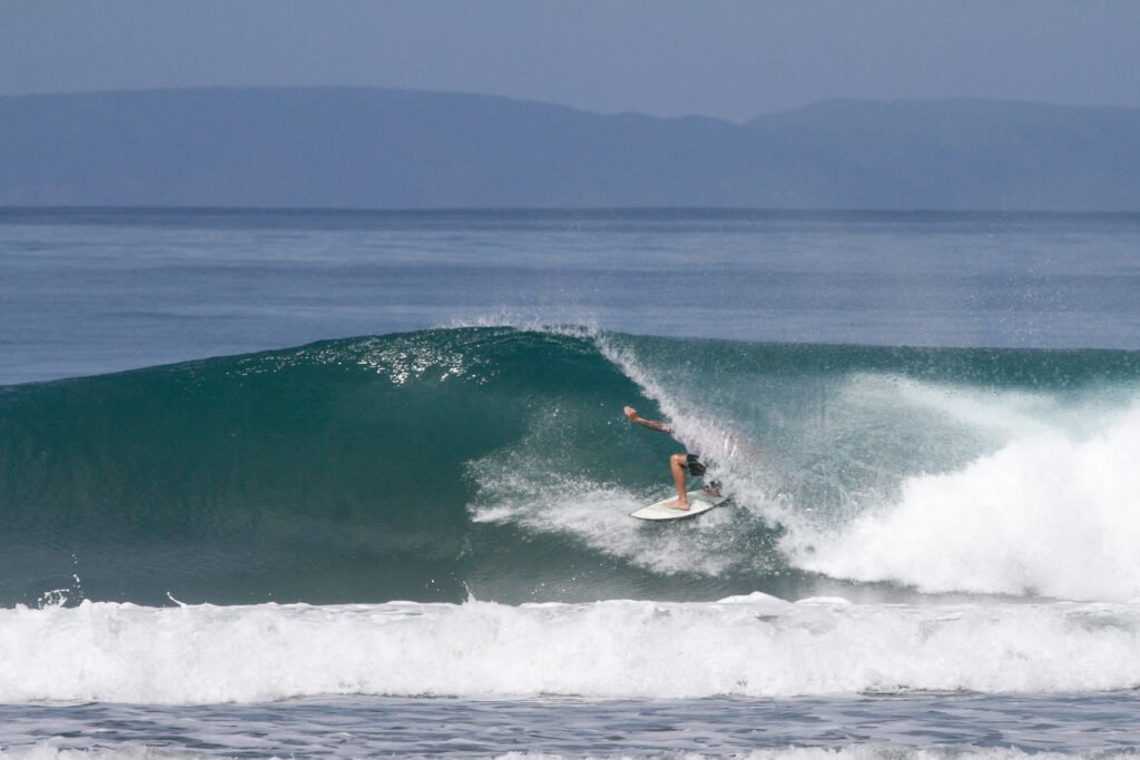 Surfer tubing at Manabi beach break